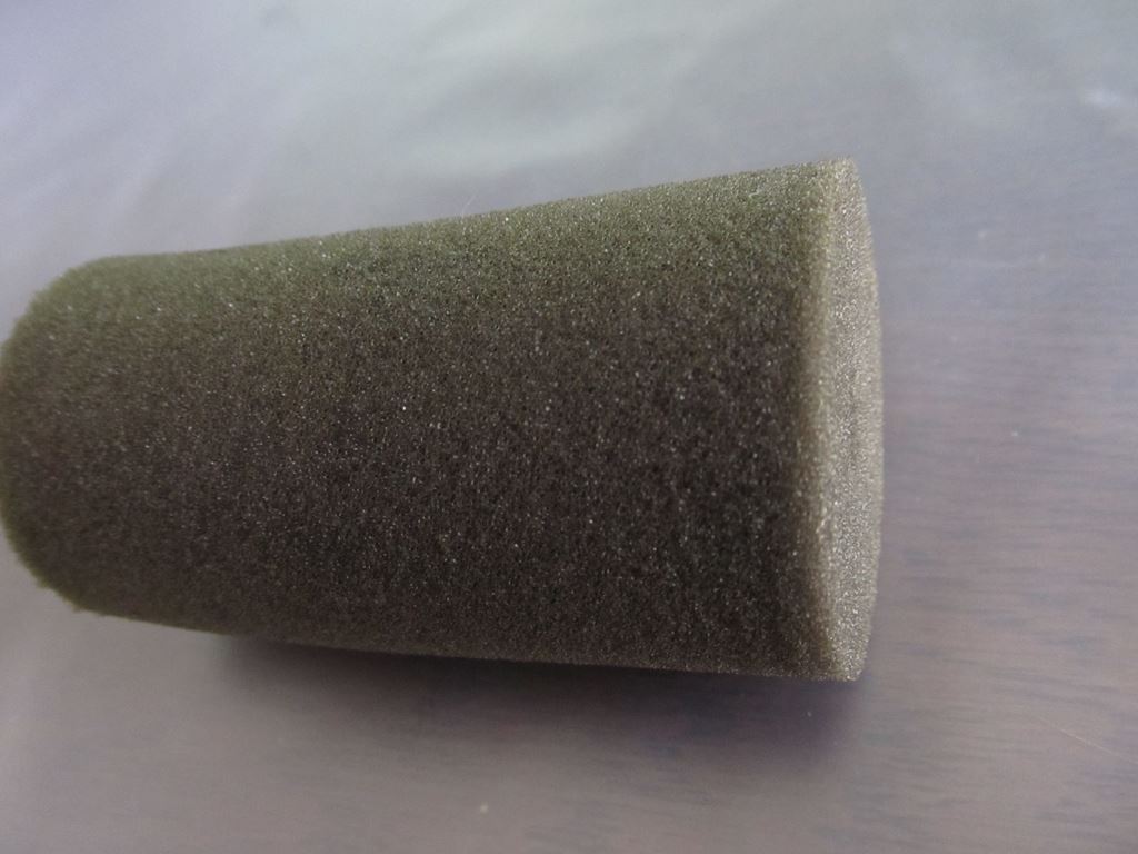 A fine-pore aquarium sponge filter foam on a table